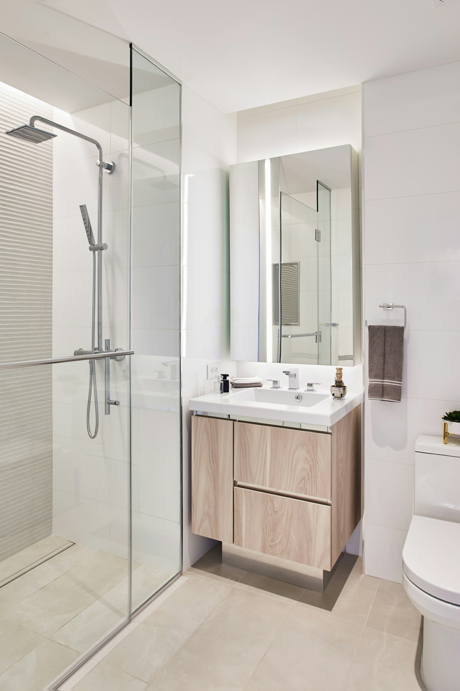 a room with a sink and a shower