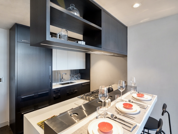 a kitchen with a sink and a microwave