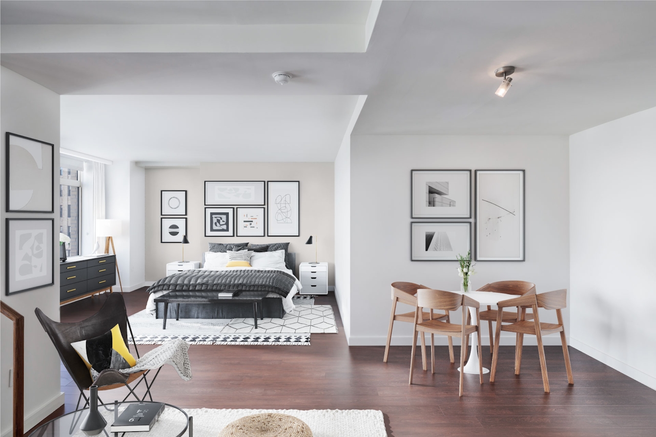 a living room filled with furniture and a fireplace