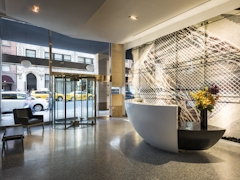 Thumbnail of Atlas New York: 39D a room filled with furniture and a large window