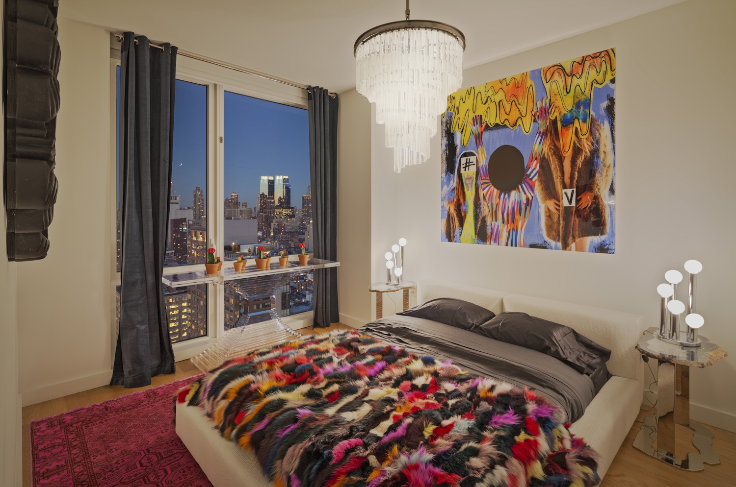 a bedroom with a bed in a room