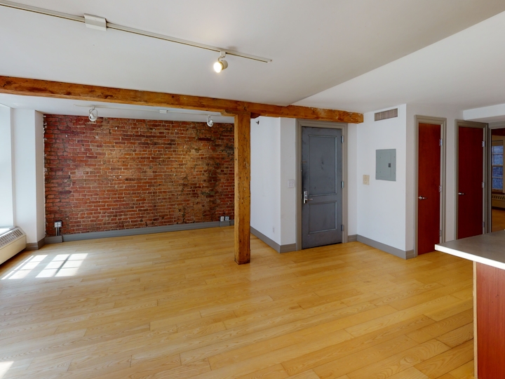 a room with a hard wood floor