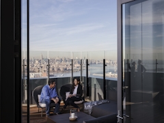 Thumbnail of The Ashland: 36D a man sitting in front of a window