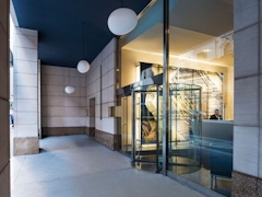 Thumbnail of Atlas New York: 33F a large building with a store on the floor