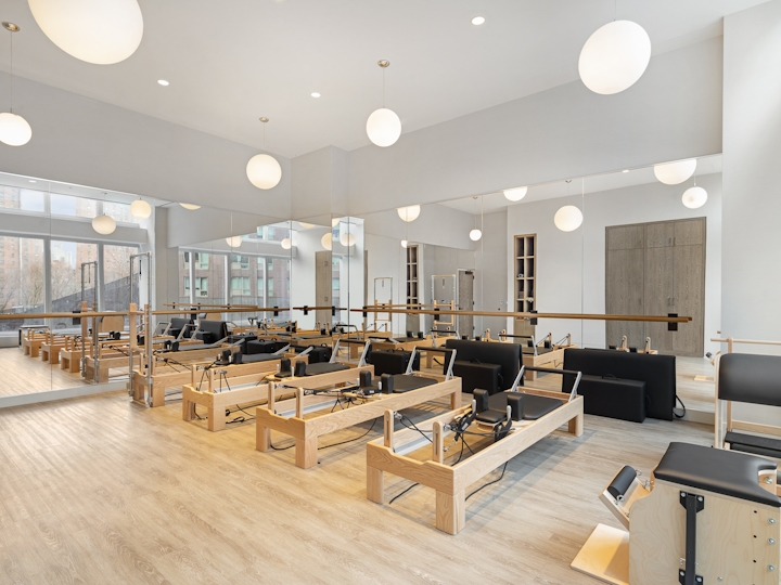 a room filled with furniture on top of a wooden table