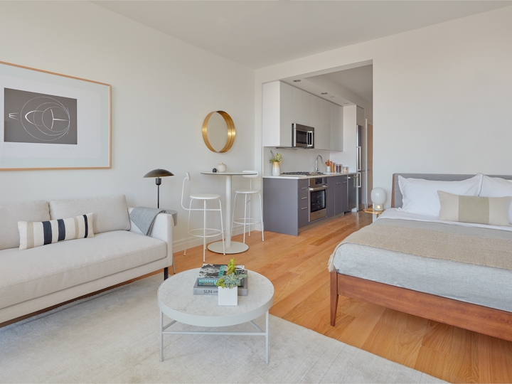 a bedroom with a large bed in a room