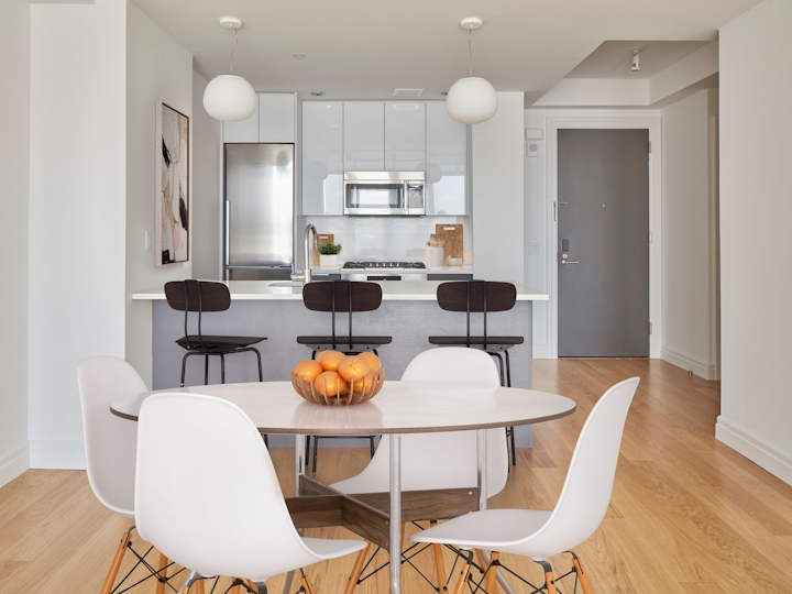 a living room filled with furniture and a table