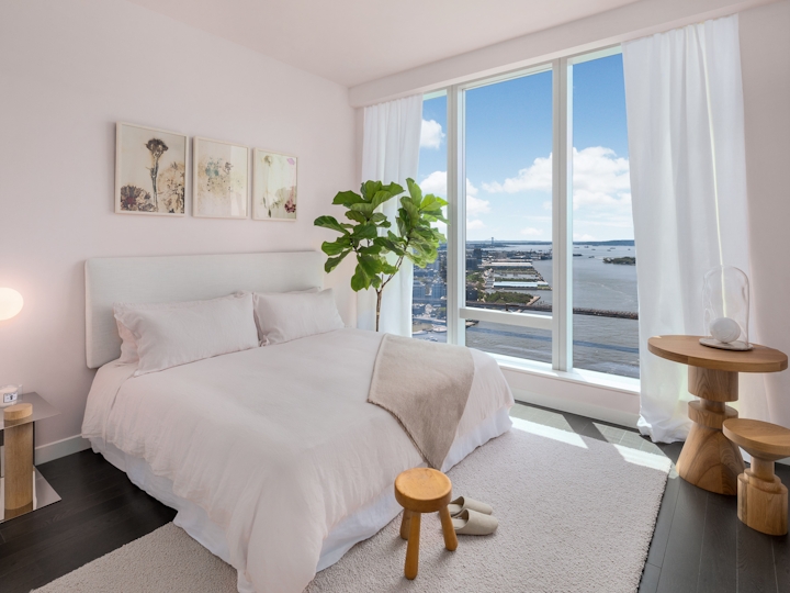 a hotel room with a large window