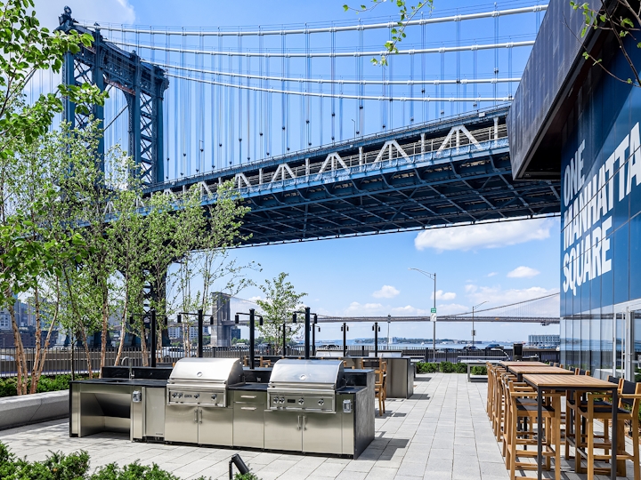 a bridge with a building in the background