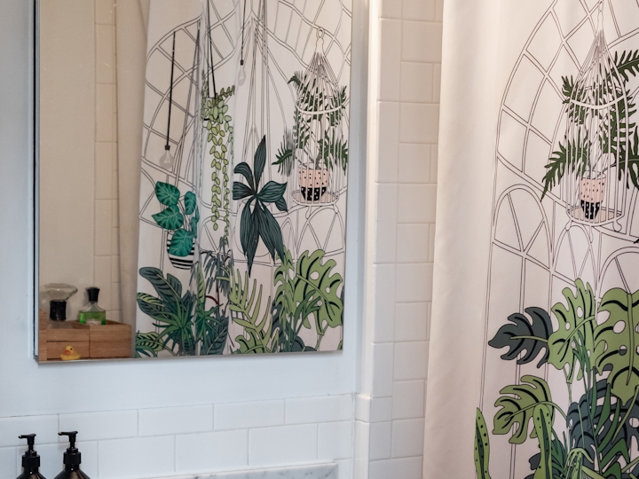 a room with a sink and a mirror