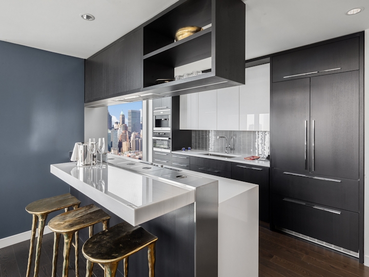 a modern kitchen with stainless steel appliances