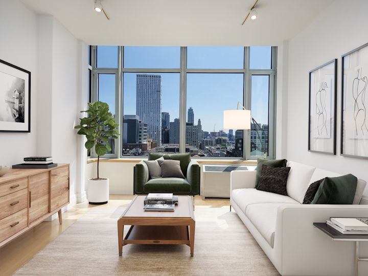 a living room filled with furniture and a flat screen tv