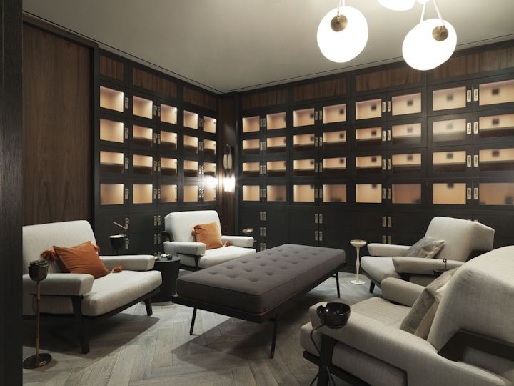 a living room filled with furniture and a large window