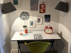 Thumbnail of Gotham West: 531 a room with a table and chairs