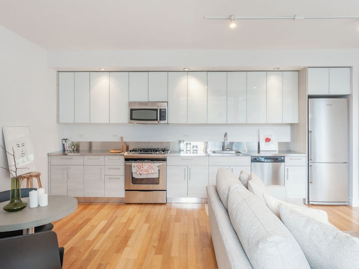 a modern kitchen with stainless steel appliances