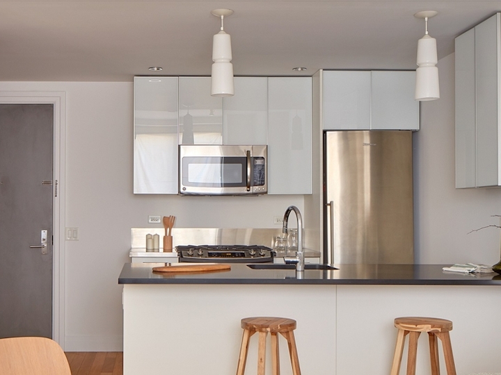 a kitchen with a table in a room