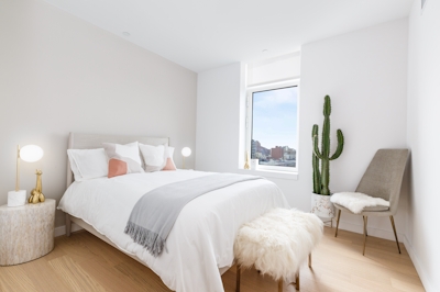 a bedroom with a bed in a hotel room