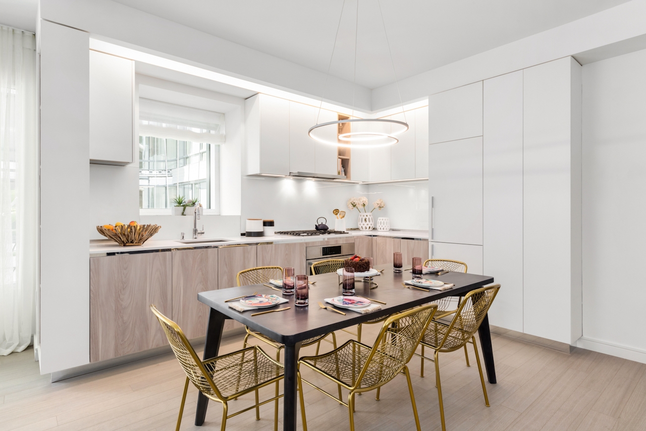 a kitchen with a dining table