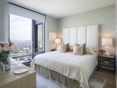 Thumbnail of The Ashland: PH2D a bedroom with a large bed in a hotel room