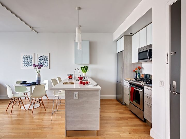 a kitchen with a wood floor