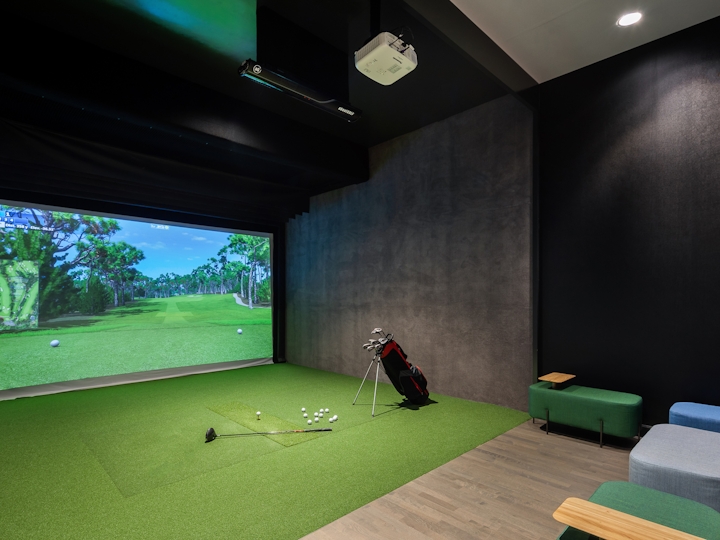 a room filled with lots of green grass