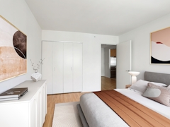 Thumbnail of The Nicole: 4K a bedroom with a bed in a room
