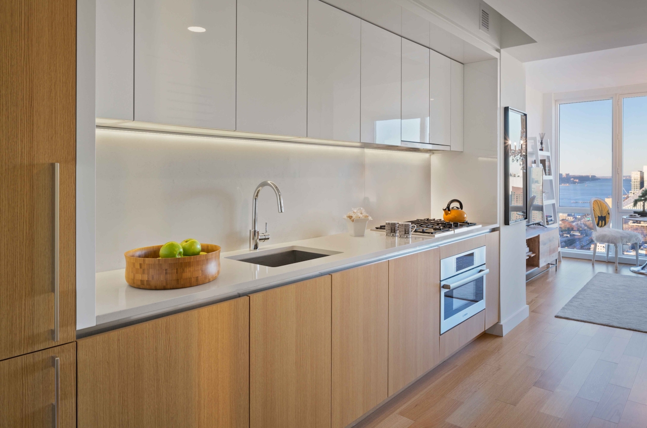 a kitchen with a sink and a window