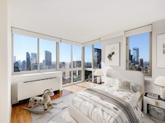 Thumbnail of Atlas New York: 44C a bedroom with a large window