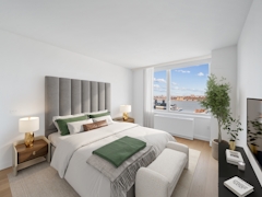 Thumbnail of Gotham West: 3003 a living room with a bed and a window