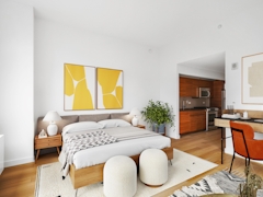 Thumbnail of Gotham West: 418 a living room filled with furniture and a fireplace