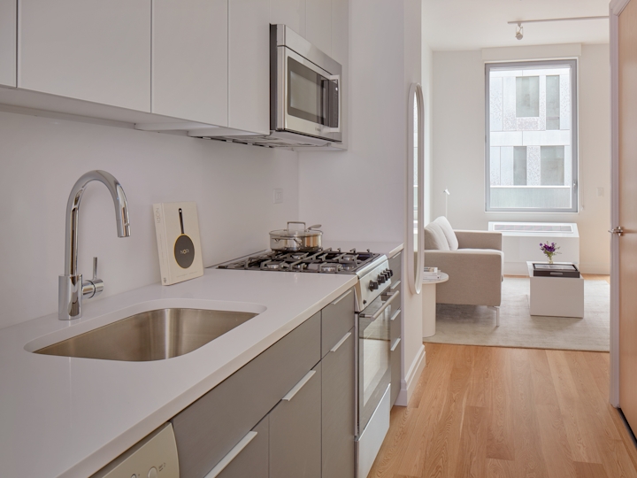 a kitchen with a sink and a window