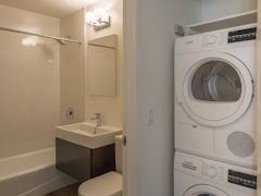 Thumbnail of Atlas New York: 39D a white sink sitting under a mirror