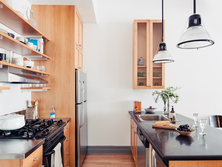 a kitchen with a stove and a sink
