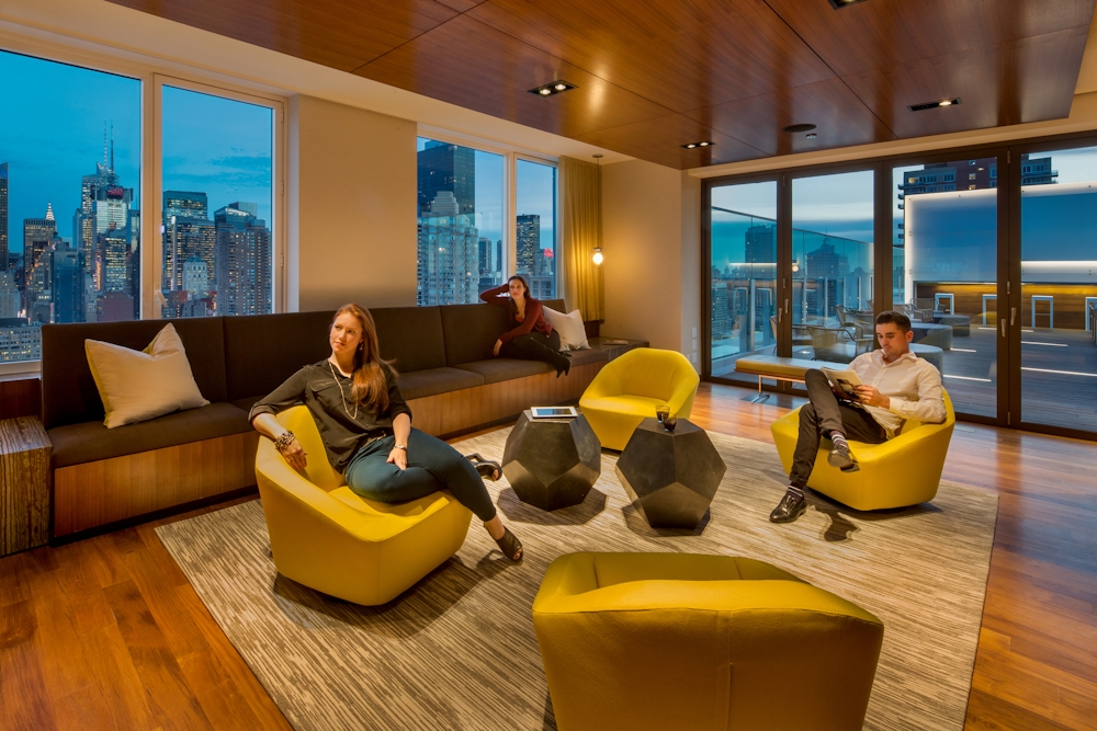 Gotham West: 2717 a living room filled with furniture and a large window