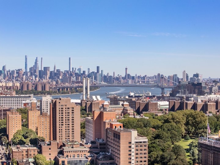 a view of a city with tall buildings in the background