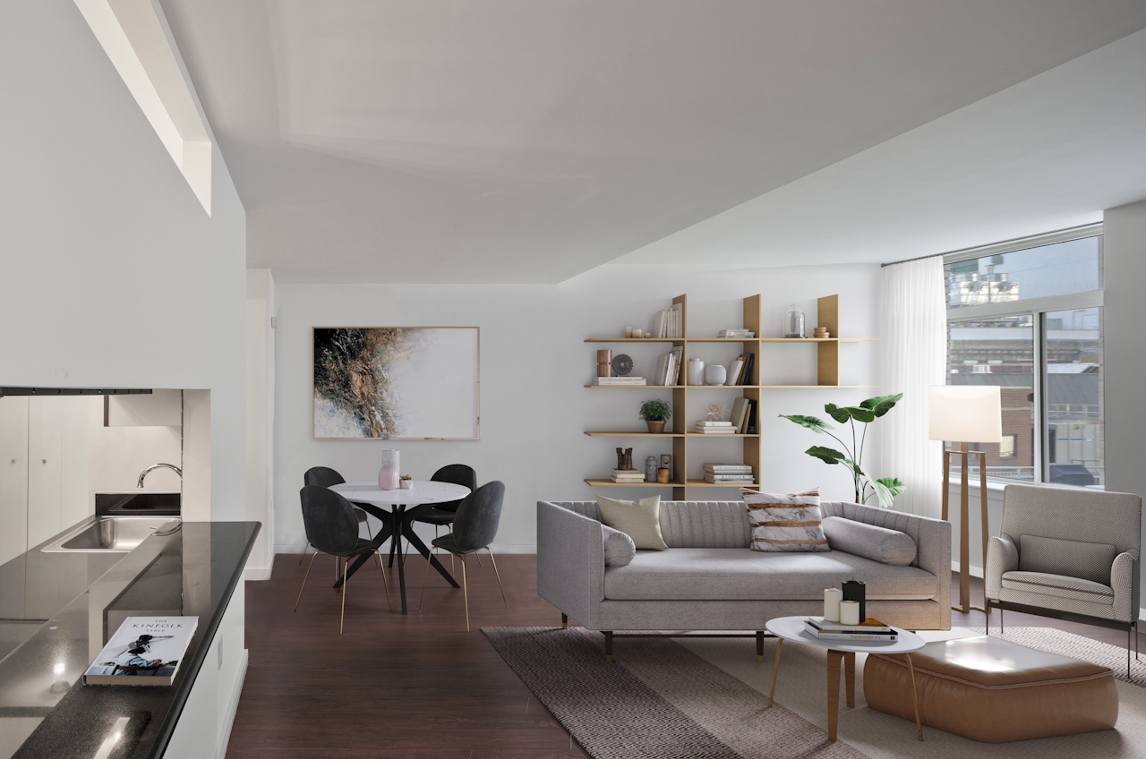 a living room filled with furniture and a table