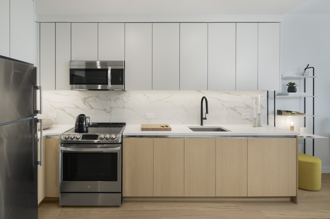 a stainless steel refrigerator in a kitchen
