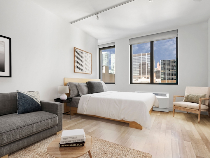 a living room filled with furniture and a flat screen tv