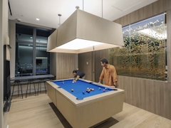 Thumbnail of The Ashland: 18M a kitchen with an island in the middle of a room