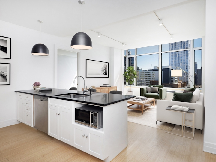 a kitchen with a table in a room