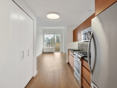 Thumbnail of Gotham West: 2717 a kitchen with a wood floor