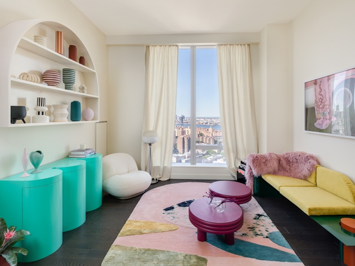 a bedroom with a large window