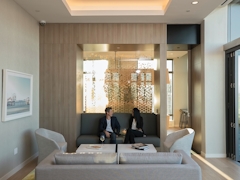 Thumbnail of The Ashland: 38G a living room filled with furniture and a large window