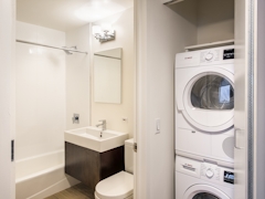 Thumbnail of Atlas New York: 36B a white sink sitting under a mirror