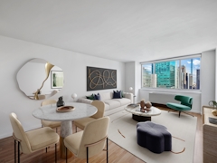 Thumbnail of Atlas New York: 39D a living room filled with furniture and a large window