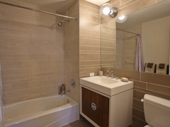 Thumbnail of Gotham West: 531 a white tub sitting next to a shower